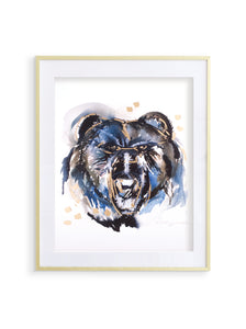 A framed and matted print featuring a stylized bear, predominantly in shades of blue and black, with metallic gold accents, on a white background.